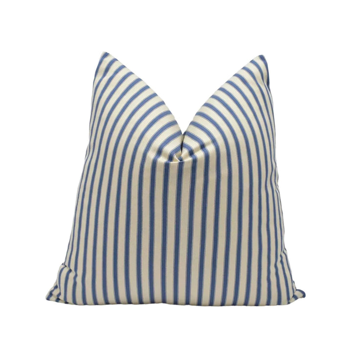 A single pillow with a striped pattern in blue and white colors.