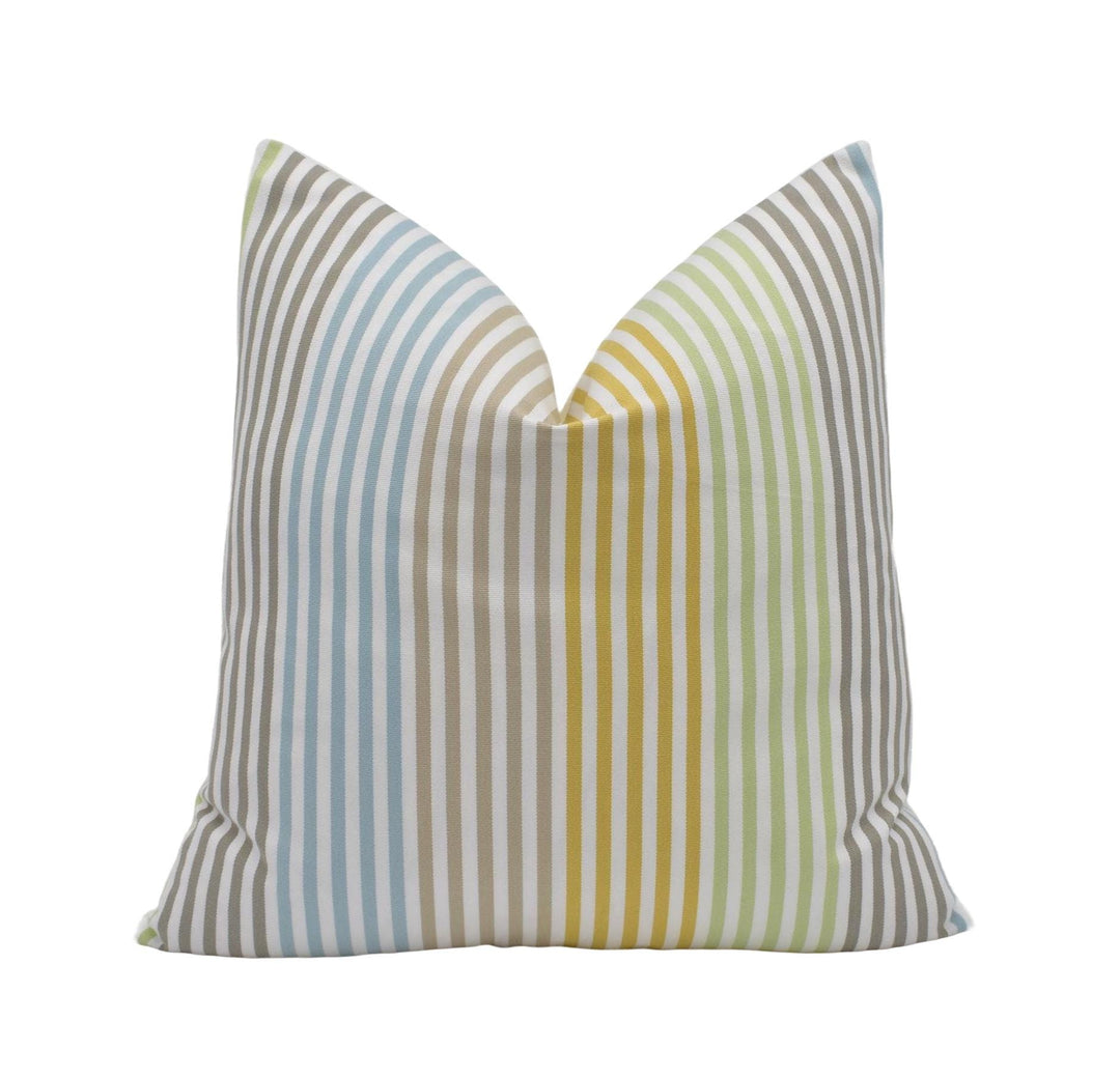 A single pillow with a striped pattern in various colors, including blue, green, yellow, and gray.