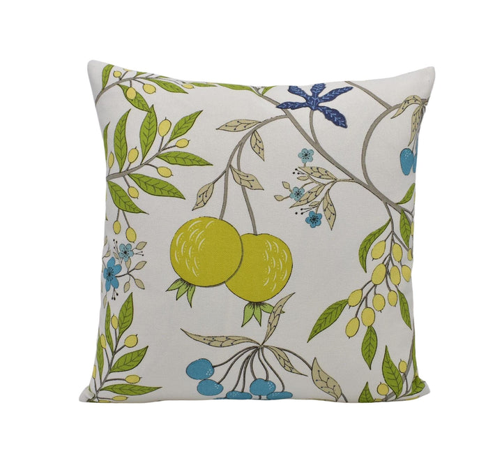 A square throw pillow with a floral pattern featuring yellow fruits, leaves, and flowers in various shades of green and blue.
