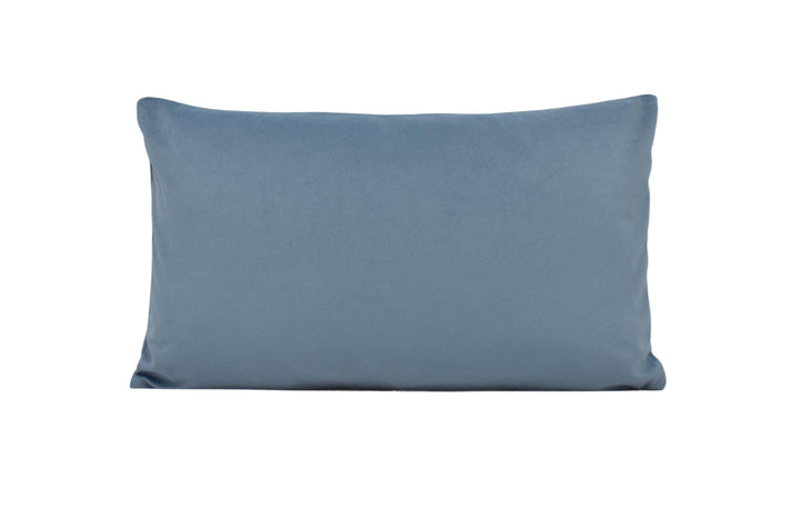 a blue pillow on a white background