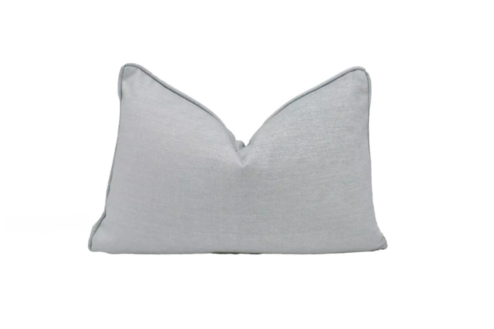 A single light gray pillow with a simple, clean design.