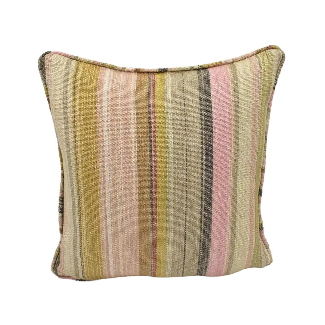 A striped throw pillow with a mix of pink, yellow, and green colors is placed against a white background.