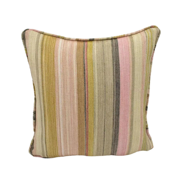 A striped throw pillow with a mix of pink, yellow, and green colors is placed against a white background.