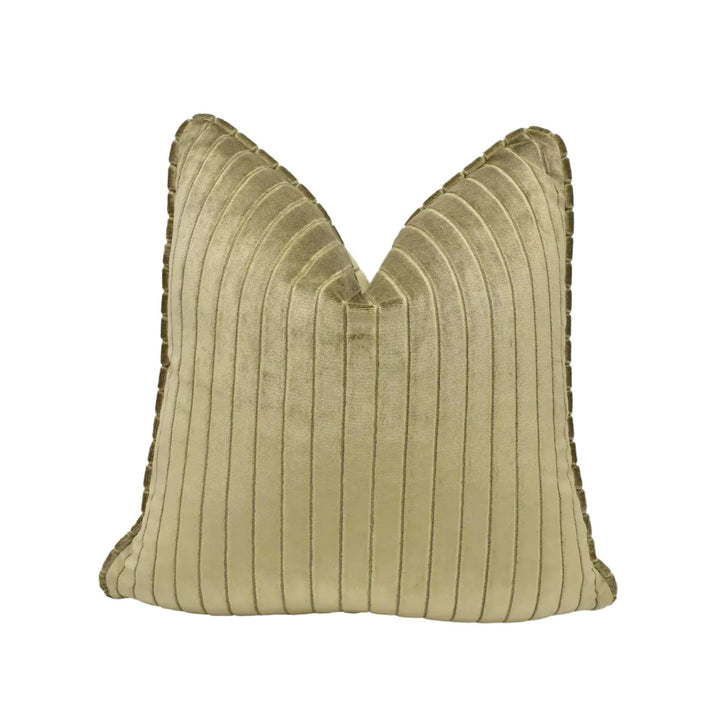 A beige, textured pillow with a ribbed edge and a striped pattern.