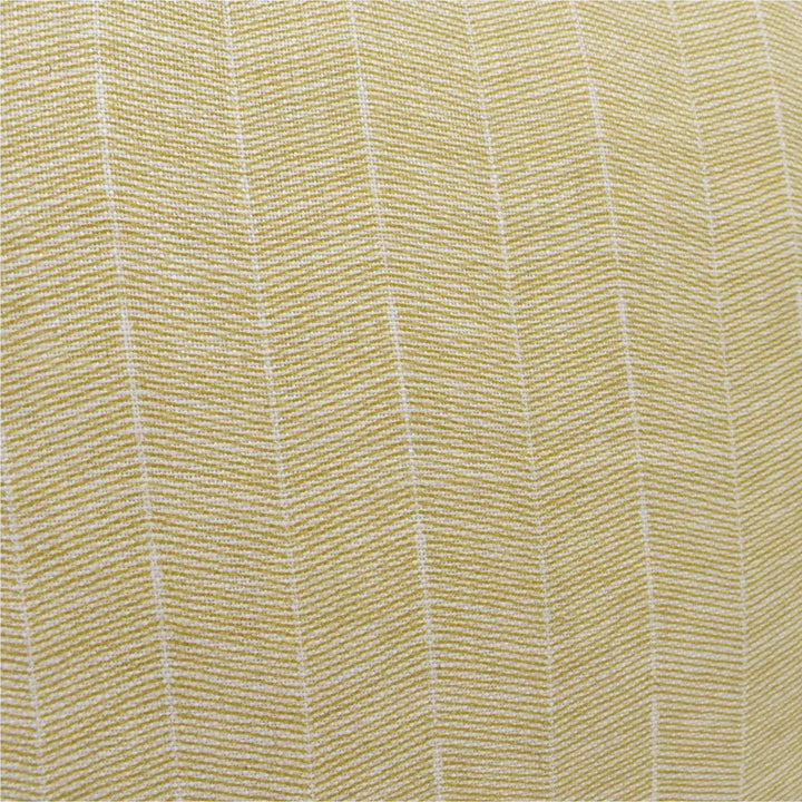 a close-up view of a fabric with a herringbone pattern, featuring a diagonal arrangement of lines that create a textured appearance.