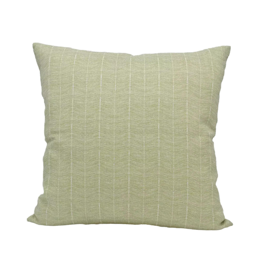 A square throw pillow with a herringbone pattern in a light green color.