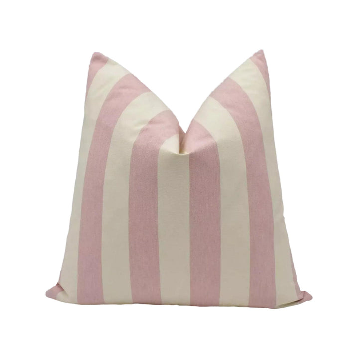 A single pillow with a striped pattern in shades of pink and cream.