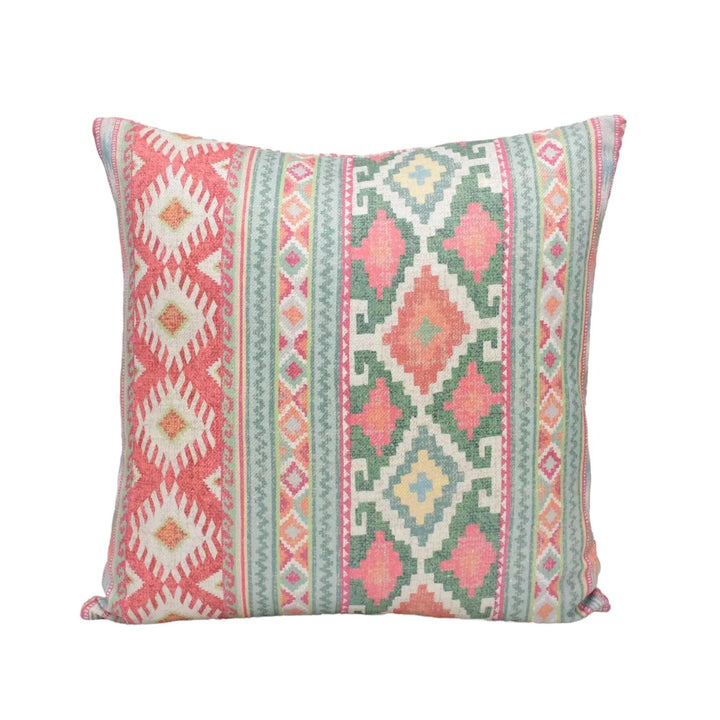 A square throw pillow with a vibrant, colorful geometric pattern in shades of pink, green, and white.