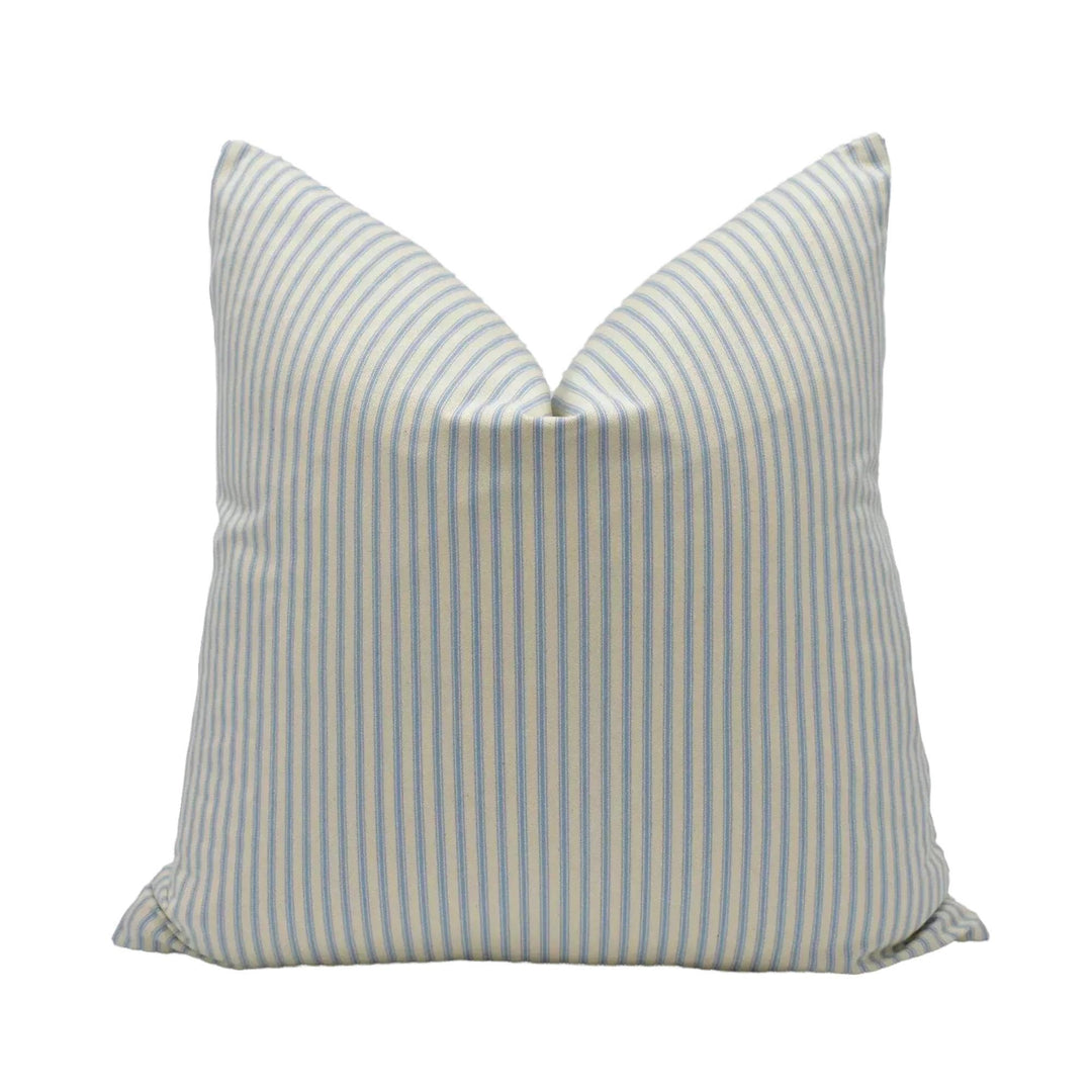 A single pillow with a striped pattern in shades of blue and white.