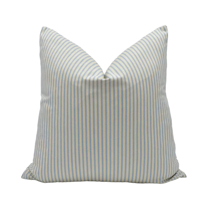 A single pillow with a striped pattern in shades of blue and white.