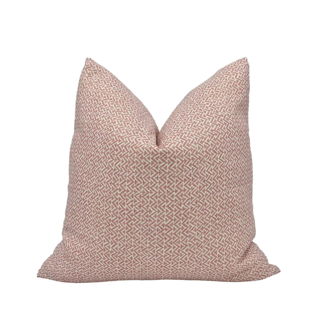 A single pillow with a pink and white zigzag pattern.