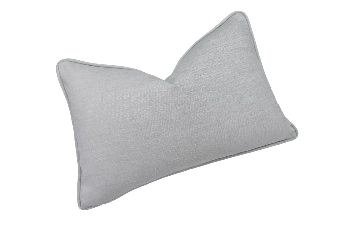 A single gray pillow against a white background.