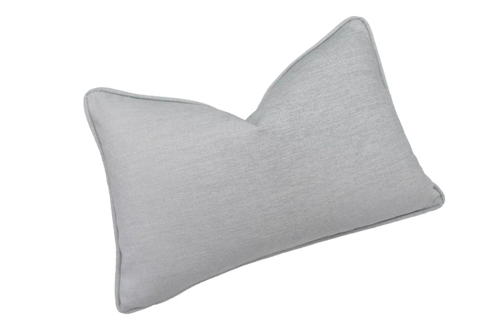 A single gray pillow against a white background.