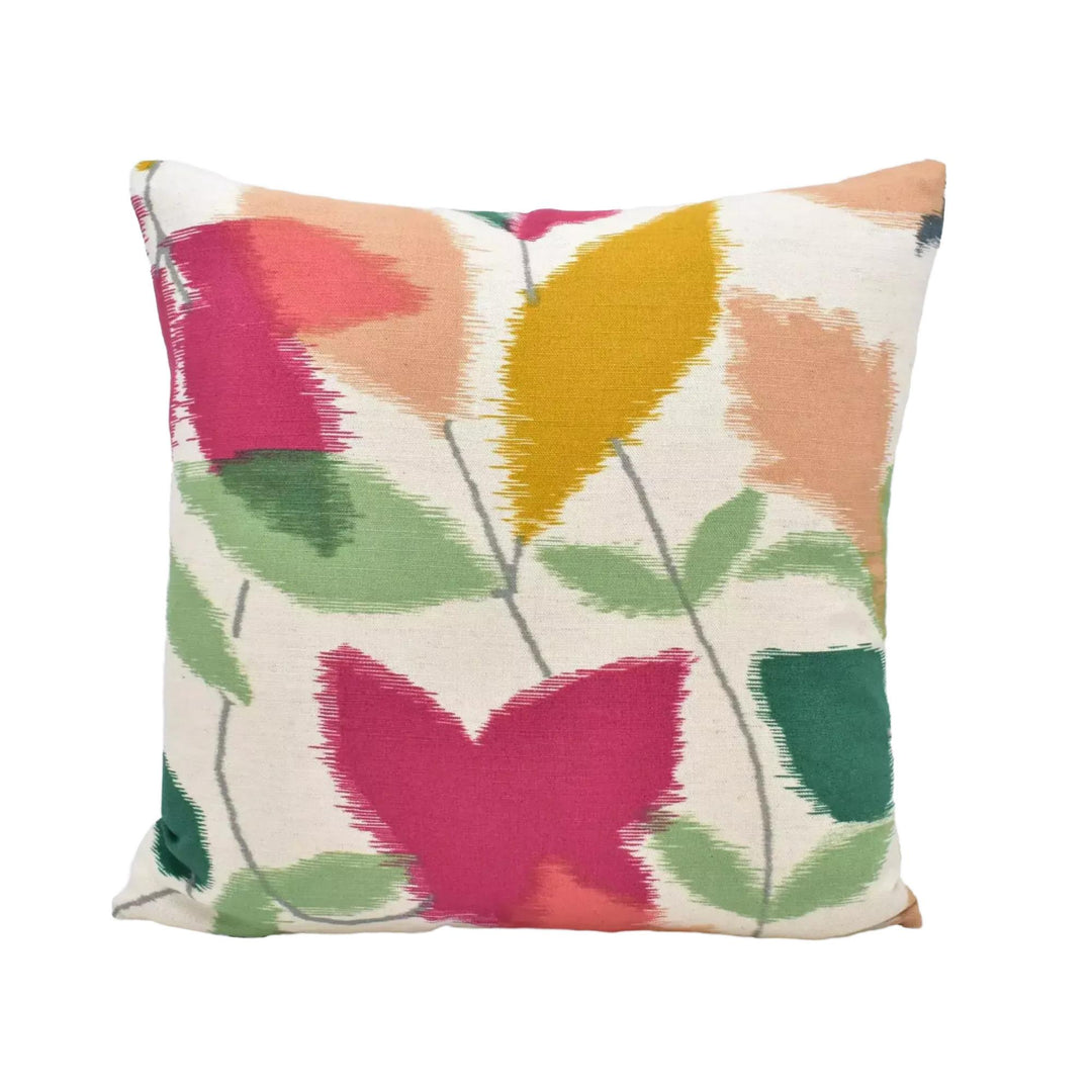 a colorful, abstract floral pattern on a pillow.