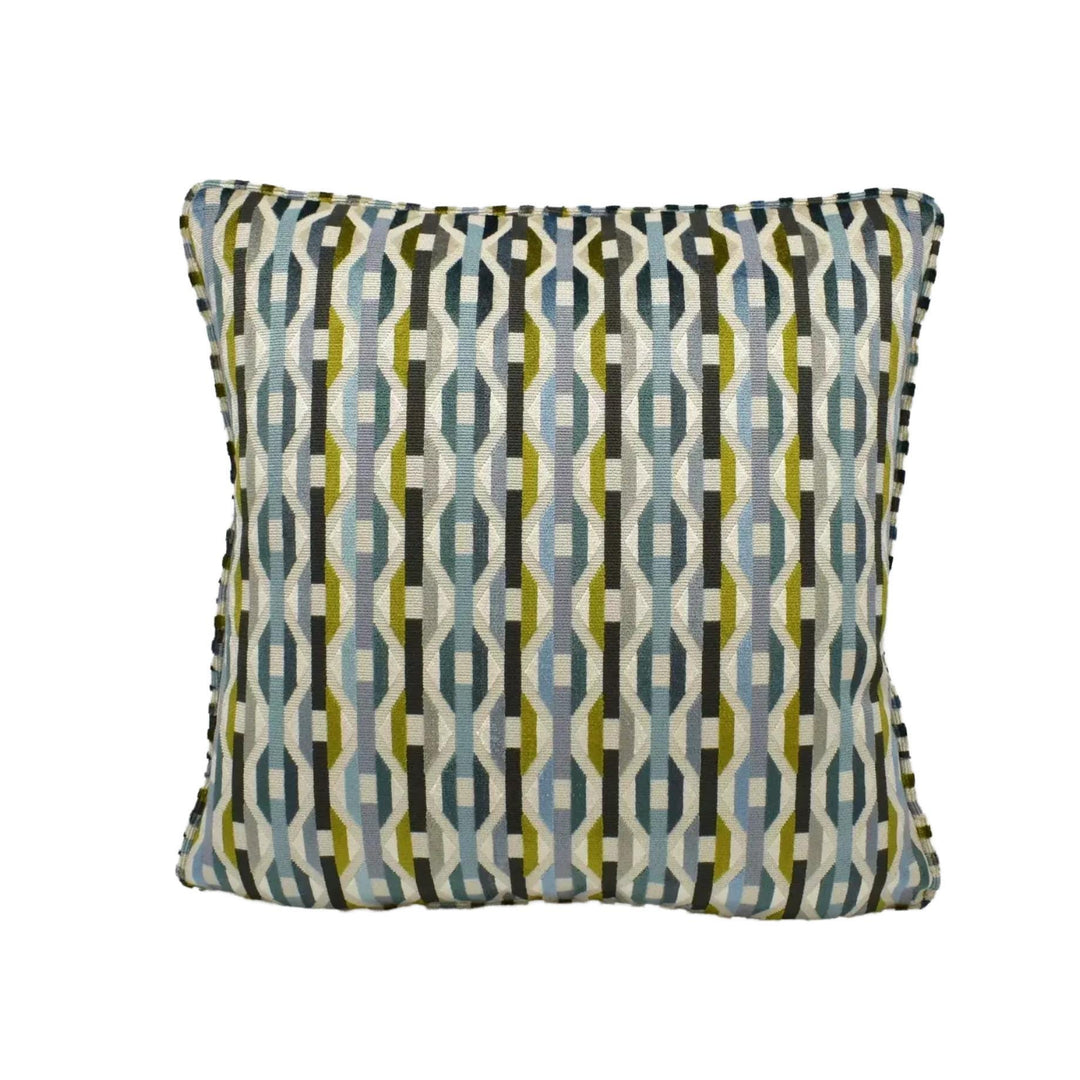 A square throw pillow with a geometric pattern in shades of blue, green, and gray.