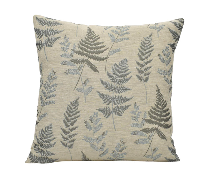 a pillow with a leaf pattern on it