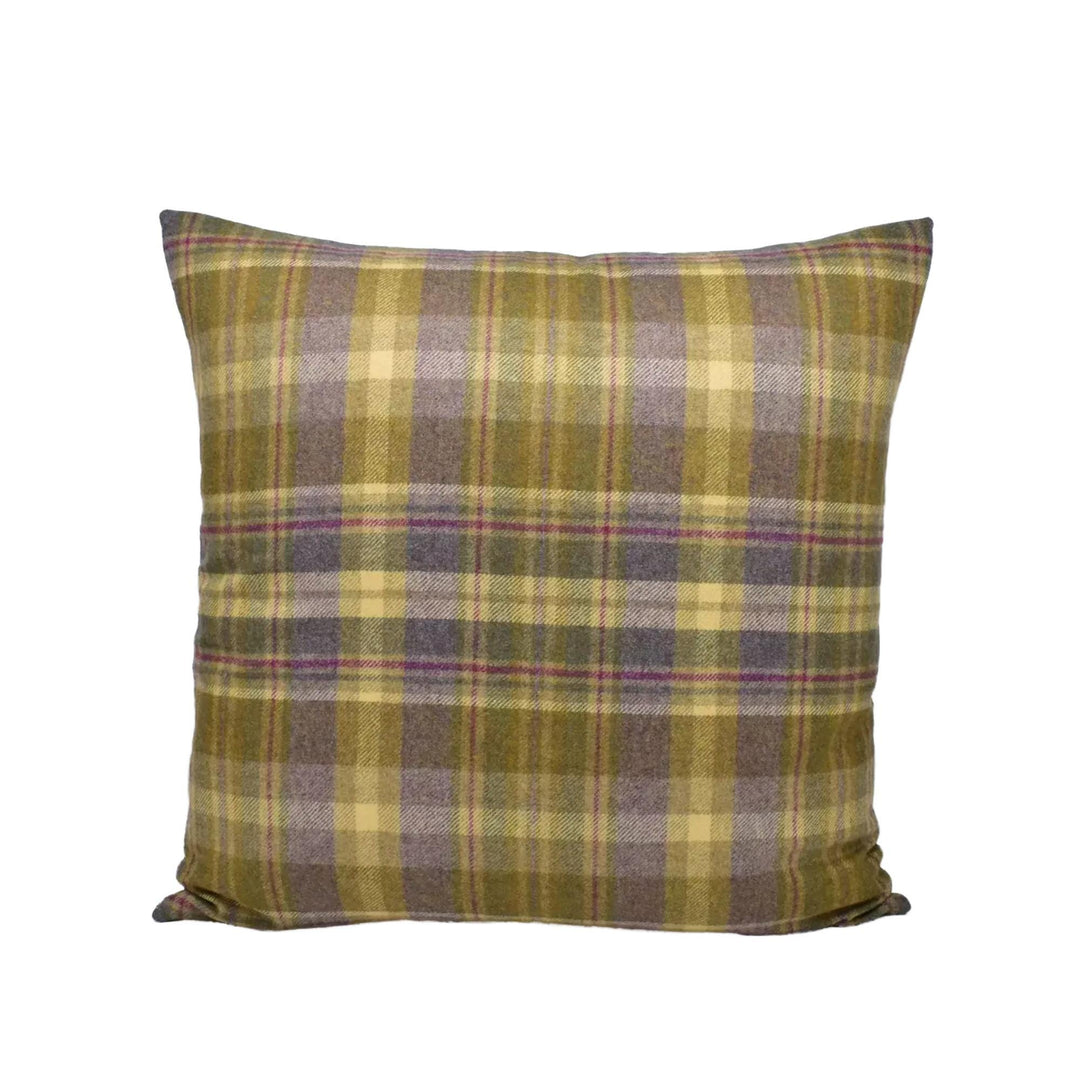 A square throw pillow with a plaid pattern in shades of green, purple, and yellow.